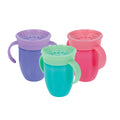The Nuby 360 Wonder Cup with Handles (3 Pack - 7 oz) in purple, pink, and aqua is shown side by side on a white background, each featuring a translucent lid to help prevent spills.