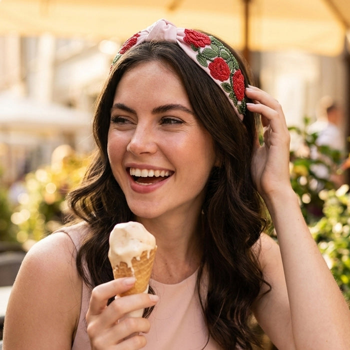 Bold rose embellished headband perfect for garden parties, brunches, and festive styling