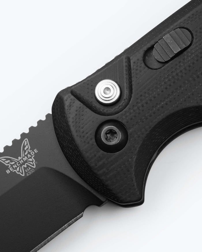 Benchmade CLA Black G10 Handle Detail - Actuation Button Close-up | Benchmade Knife Co.