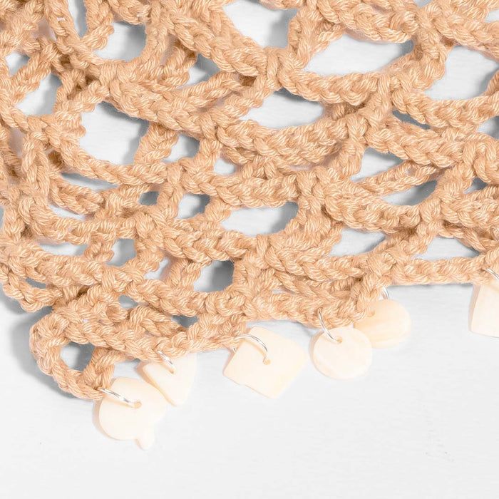 Beige crochet beanie cap with shell charms