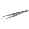 Pair of silver tweezers on a white background