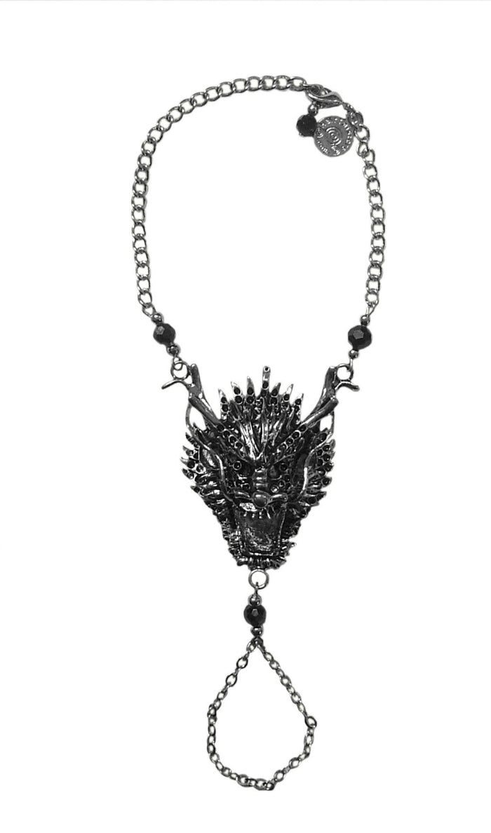 Dragon head hand chain finger bracelet with adjustable wrist chain and black bead accents, front view