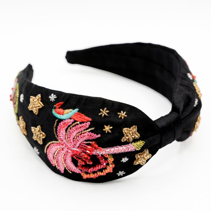 Hand-embroidered tropical bird headband with sequins, crystals, and beadwork on black base
