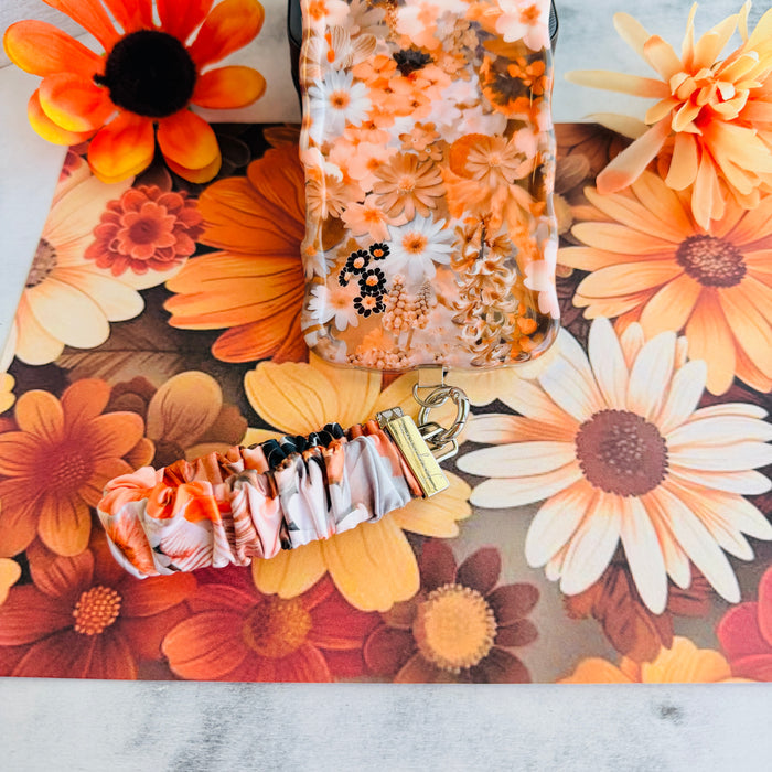 Fall Blooms autumn floral scrunchie phone wrist strap in orange and cream from Fancy Bands