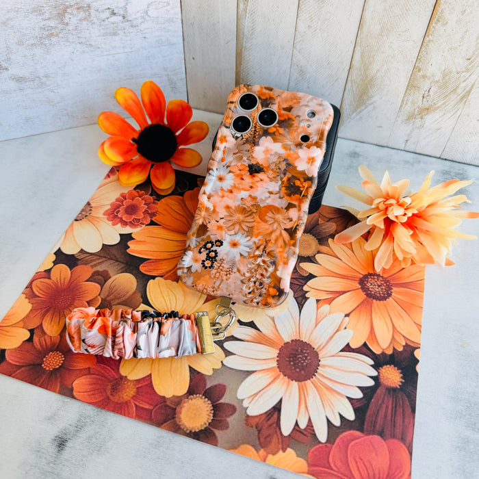 Fall Blooms autumn floral scrunchie phone wrist strap in orange and cream from Fancy Bands