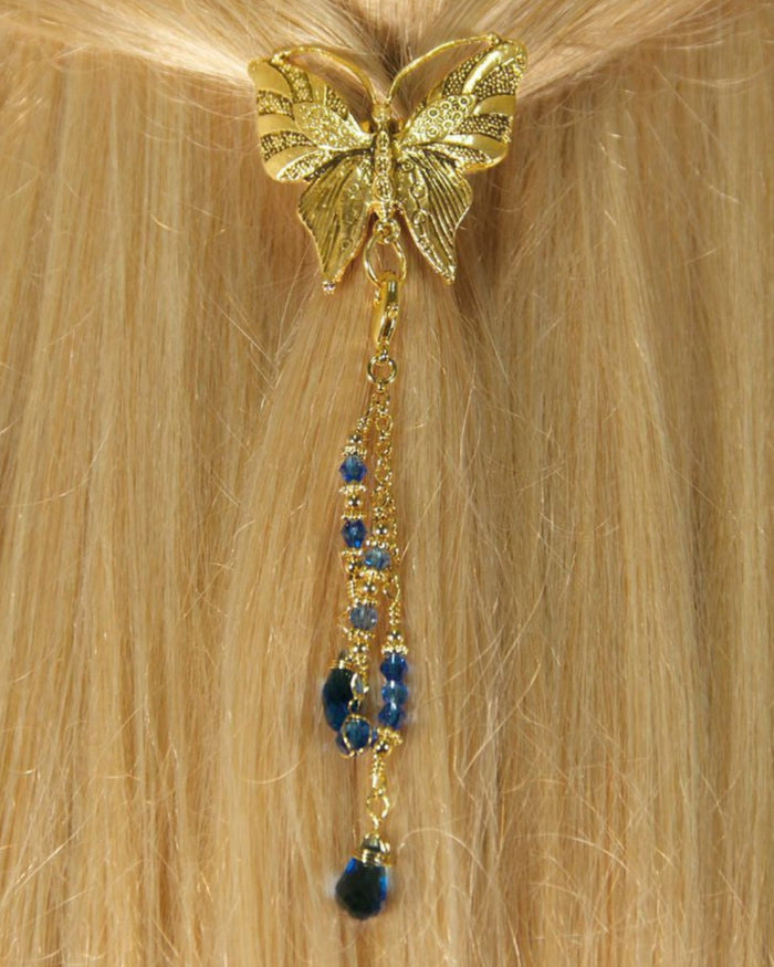 Gold butterfly hair hook ponytail holder with dangling blue crystal bead charms worn in blonde ponytail, back view