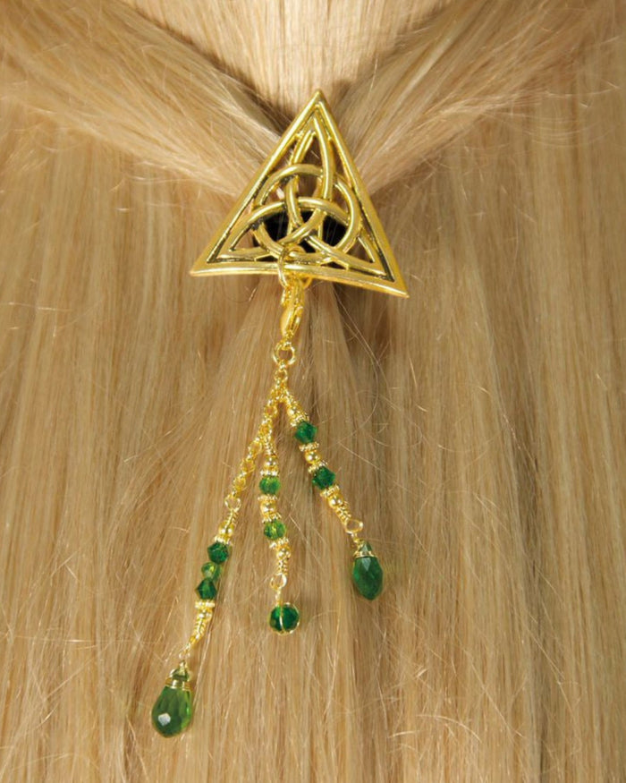 Gold Celtic triangle hair hook with dangling green bead charms worn in ponytail, back view