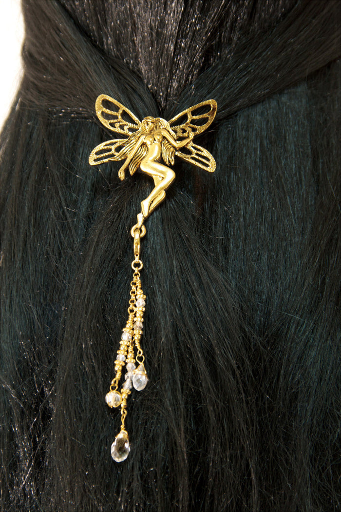 Gold Tinkerbell hair hook with dangling crystal bead charms worn in ponytail, back view