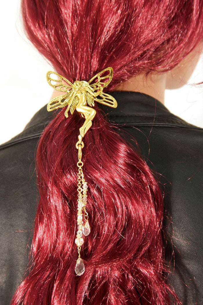 Model wearing Hair Hook Gold Tinkerbell with Bead Charm Ponytail Holder