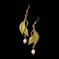 Handmade Chanhua thread-wrapped earrings featuring elegant green leaves, purple bead accents, and pearl drops.