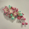 Handmade Ronghua crabapple blossom soft hair stick in pink mulberry silk on beige background