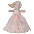 Stuffed animal toy with a lace dress on a white background
