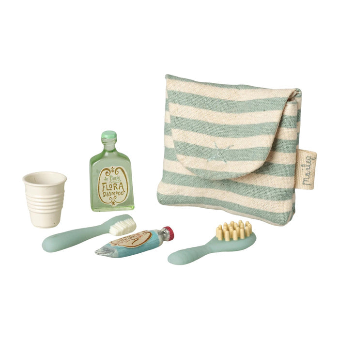 Set of mouse toiletries including a striped pouch, cup, bottle, toothbrush, and brush on a white background.