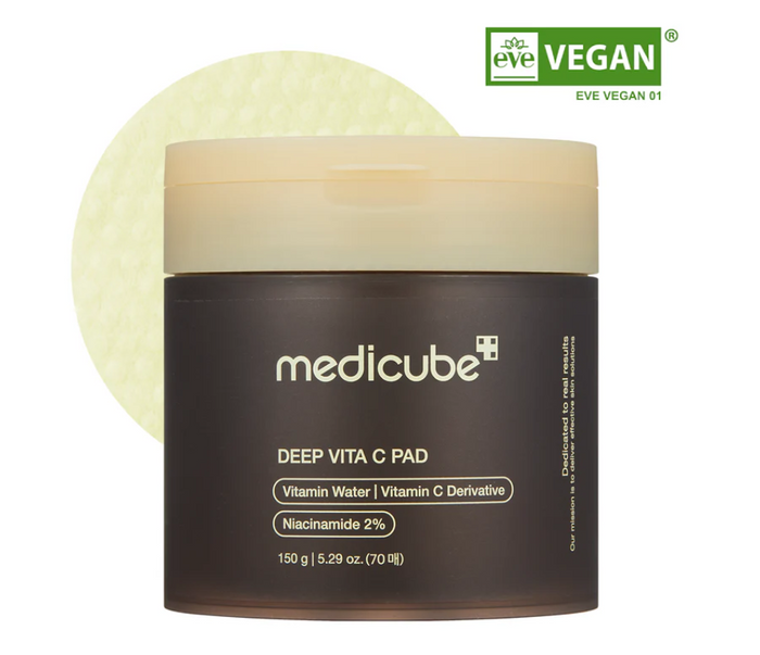 Medicube Deep Vita C Pad with a brown jar on a white background