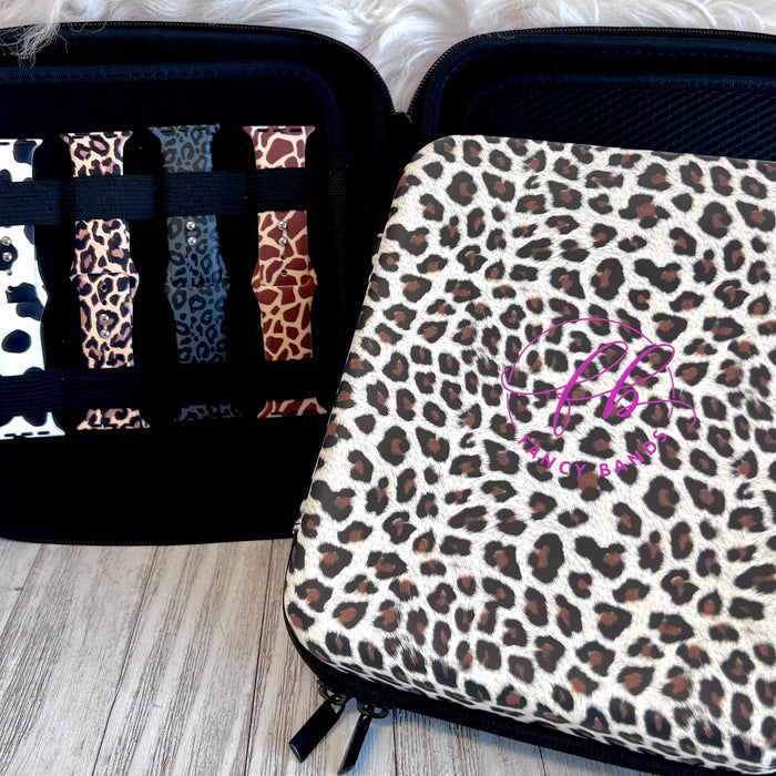 Mini  Leopard Print Fancy Band Storage Case — Case made of PU leather, Nylon, Multi spandex, Lycra Dimensions are W 9 1/4" x L 8 1/4" x H 2 1/4" This item is storage case only bands not included.