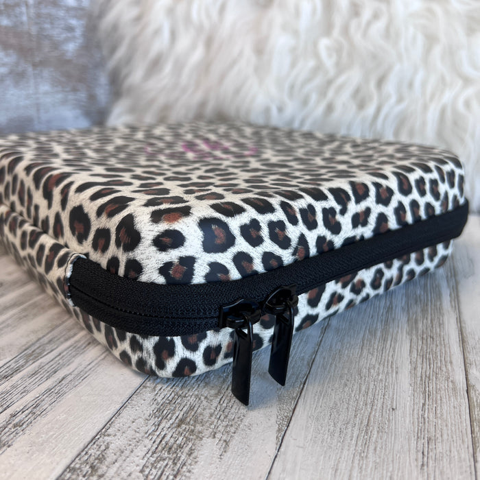 Mini  Leopard Print Fancy Band Storage Case — Case made of PU leather, Nylon, Multi spandex, Lycra Dimensions are W 9 1/4" x L 8 1/4" x H 2 1/4" This item is storage case only bands not included.