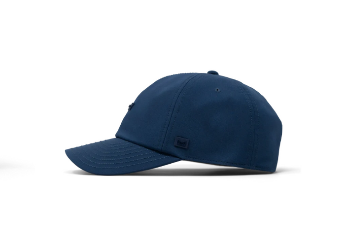 A navy blue baseball cap shown in a side profile view against a clean white background.