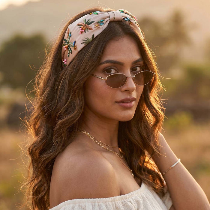 Hand-embroidered palm tree headband with colorful beadwork on beige satin