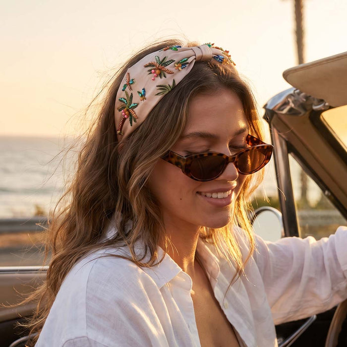 Knotted headband with palm tree embroidery - perfect for poolside styling