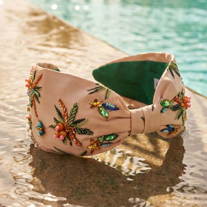 Hand-embroidered tropical headband with beaded palm trees - handcrafted details on soft beige satin