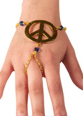 Gold peace symbol hand chain finger bracelet with blue bead accents worn on hand