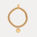 a gold bracelet with a pendant