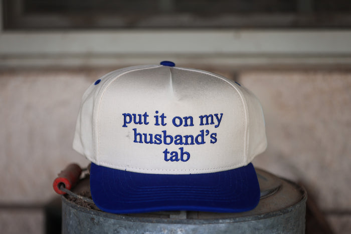 Put It On My Husbands Tab Trucker Hat