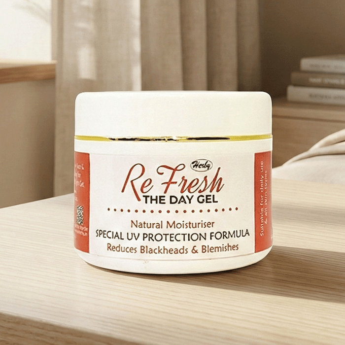 Herby ReFresh day gel jar displayed in a warm neutral interior with soft curtains and elegant minimal styling.