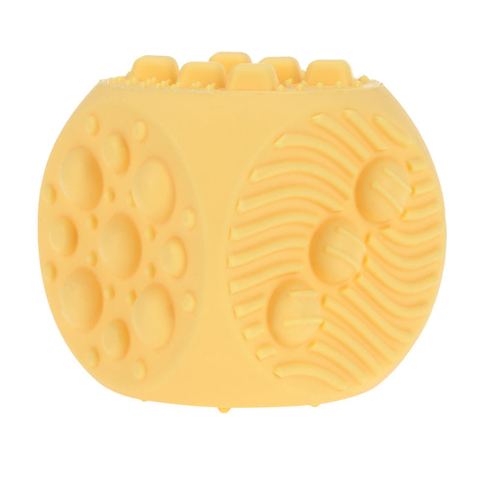 The Nuby US Silicone Popper Blocks (2 Pack) are baby sensory toys with varied textures, raised dots, and wavy lines for sensory stimulation or pet use.
