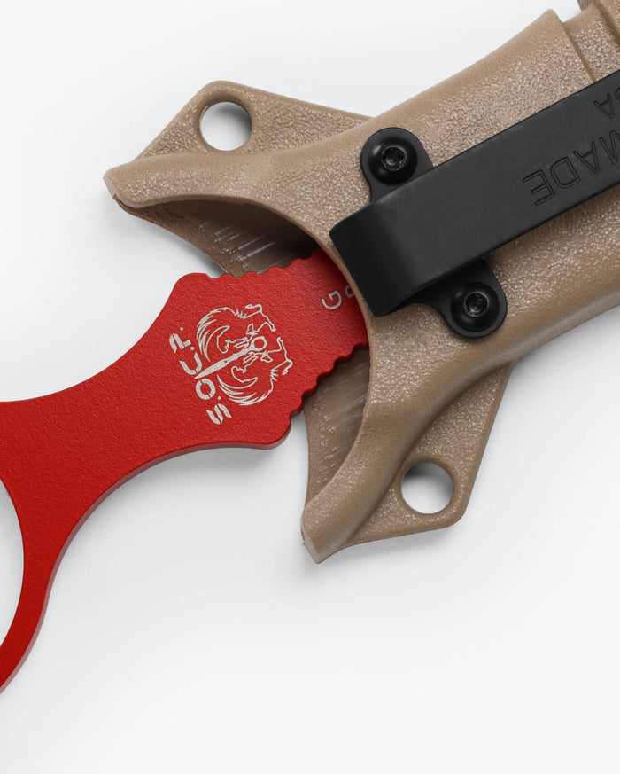 Red SOCP® Trainer knife close-up view with sheath detail - Benchmade Knife Co.