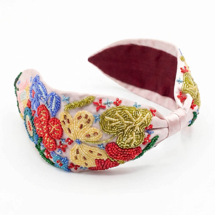 Luxury embroidered headband featuring hand-beaded flowers and plush burgundy velvet lining
